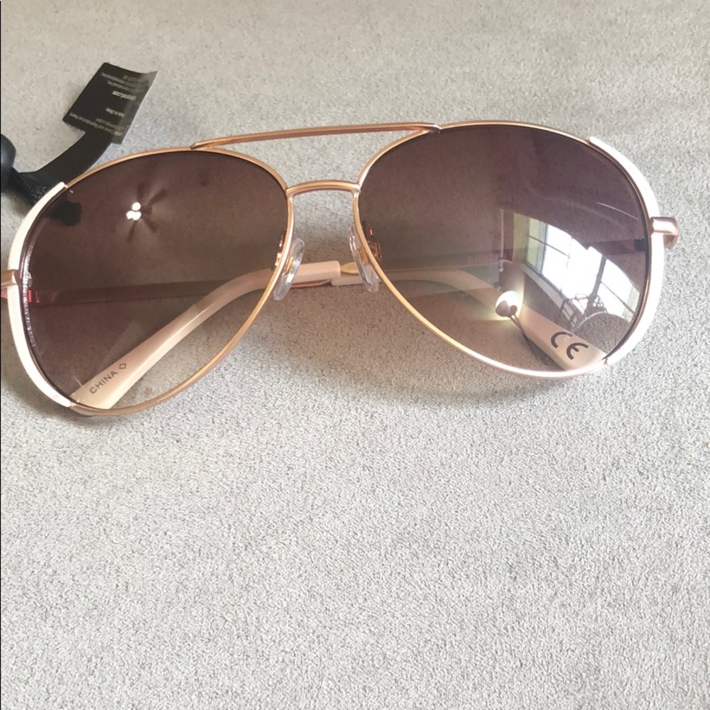 - Foster grant white edge sunglasses